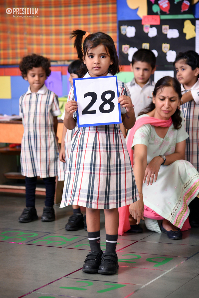 Presidium Dwarka-6, GRADE PREP STUDENTS GUESS MISSING NUMBERS ON A MATH GRID