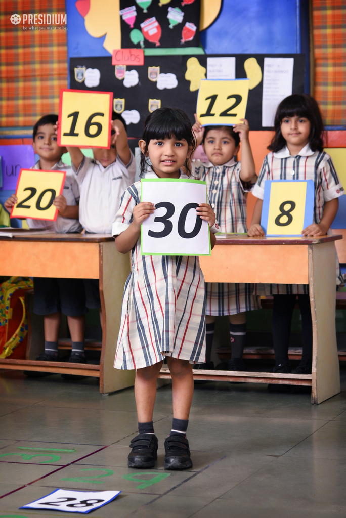 Presidium Dwarka-6, GRADE PREP STUDENTS GUESS MISSING NUMBERS ON A MATH GRID