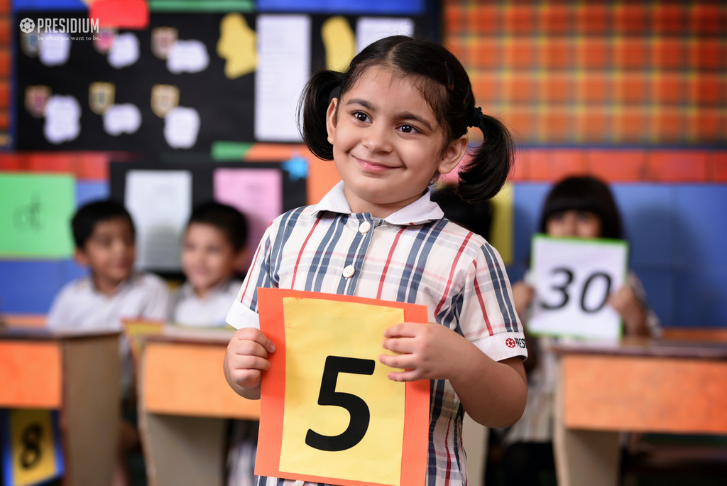 Presidium Dwarka-6, GRADE PREP STUDENTS GUESS MISSING NUMBERS ON A MATH GRID