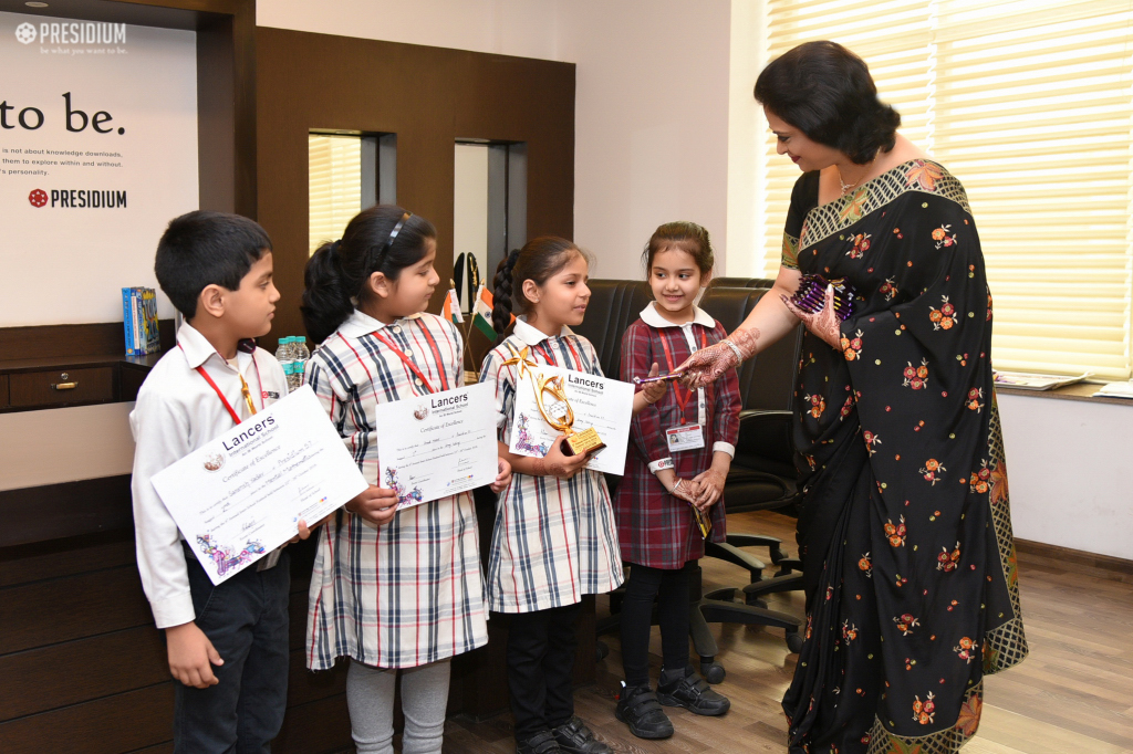 Presidium Gurgaon-57, STUDENTS & STAFF SHARE THEIR YEAR-ROUND LAURELS WITH SUDHA MA'AM