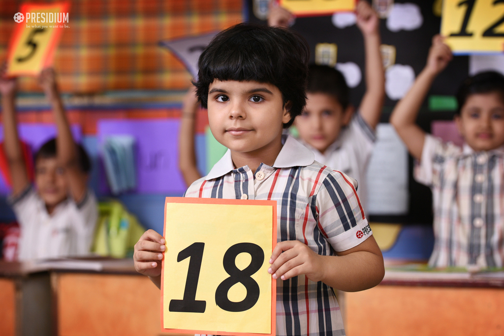 Presidium Dwarka-6, GRADE PREP STUDENTS GUESS MISSING NUMBERS ON A MATH GRID