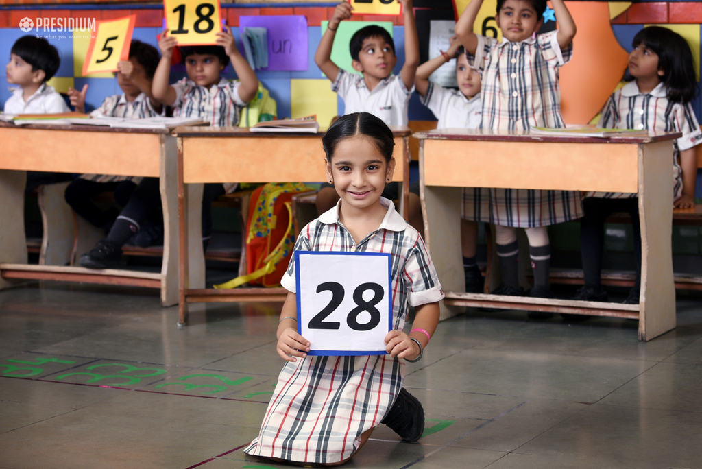 Presidium Dwarka-6, GRADE PREP STUDENTS GUESS MISSING NUMBERS ON A MATH GRID