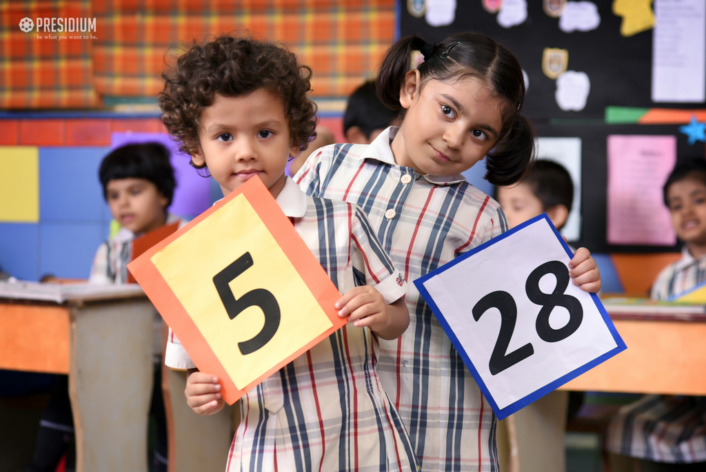 Presidium Dwarka-6, GRADE PREP STUDENTS GUESS MISSING NUMBERS ON A MATH GRID